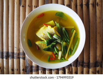 Tom Som Pla Khra Bok ( Tamarind Soup With Mullet) On Bamboo Table ,Thai Southern Style Food