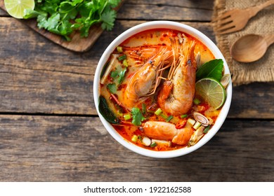 Tom Yam Kung ,Prawn and lemon soup with mushrooms, thai food in white bowl top view
