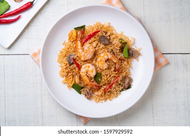 Tom Yum Fried Rice with prawns and Straw mushroom,Top view - Shutterstock ID 1597929592