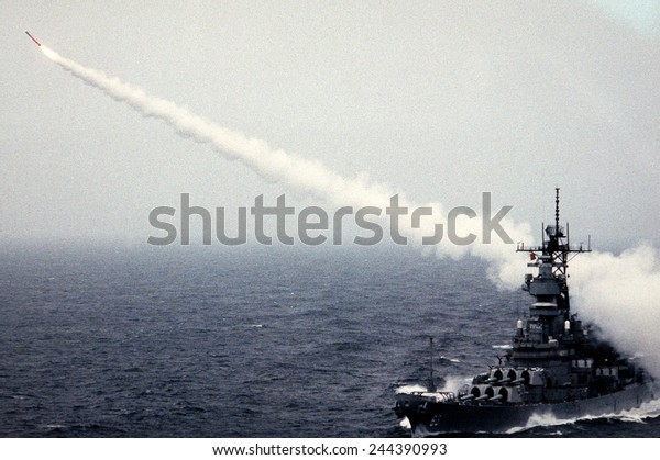 Tomahawk\
long-range cruise missile launches from the battleship USS MISSOURI\
during a weapons training exercise. June 1\
1988.