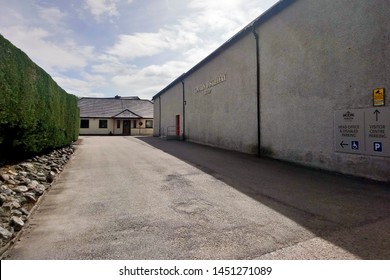 Tomatin, Inverness, Scotland - April 30 2019: The Entrance To The Tomatin Scotch Whisky Distillery