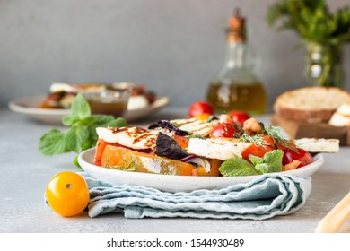 Tomato, Baked Pepper And Onion Salad With Grilled Haloumi Cheese (halloumi). Keto Diet, Healthy Food.