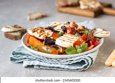 Tomato, Baked Pepper And Onion Salad With Grilled Haloumi Cheese (halloumi). Keto Diet, Healthy Food.