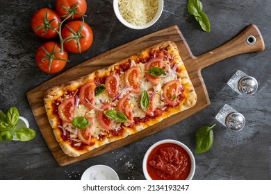 Tomato And Basil Flatbread Pizza Shot From Above