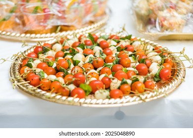 
Tomato Basil Mozzarella Caprese Appetizer Bites Arranged On Fancy Party Platter For Catering