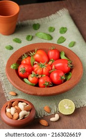 Tomato Basil Salad Vegetarian Salad Of Fresh Ripe Organic Tomatoes From Home Farm Garden Cherry Tomatoes In A Clay Bowl Raw Vegetable Salad Vegetarian Vegan Diet Kerala India. Good Source Vitamin C