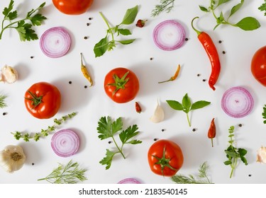Tomato, basil, spices, chili pepper, onion, garlic. Vegan diet food, creative composition on white. Fresh basil, herb, tomatoes pattern layout, cooking concept, top view. Deconstruction tomato sauce - Shutterstock ID 2183540145