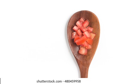 Tomato Diced Into A Spoon. Pieces