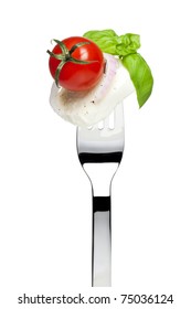 Tomato, Mozzarella Cheese, Red Onion And Basil Leaf On Fork, Isolated