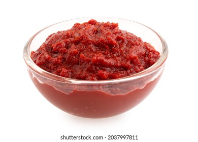 Tomato paste in a glass bowl isolated on white. - Shutterstock ID 2037997811