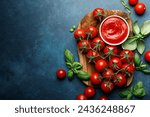 Tomato paste, sauce, ketchup and cherry tomatoes on branches and basil, top view