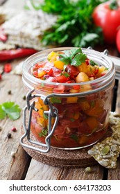 Tomato Salsa With Chili In A Glass Jar