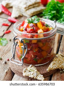 Tomato Salsa With Chili In A Glass Jar