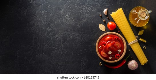 Tomato Sauce In Bowl On Black Background Texture