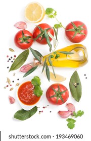 Tomato  Sauce And The Ingredients ( Olive Oil, Spices,  Lemon, Tomato), Isolated On White, Top View