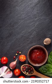Tomato Souce And Herb With Spice At Black Slate Background Table. Natural Healthy Homemade Food Concept On Tabletop Top View