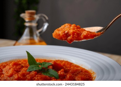 Tomato soup with basil and olive oil