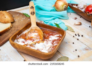 Tomato Soup On A Wooden Bowl. Side View Food Photography.