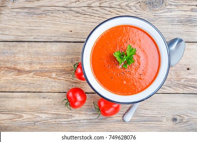 Tomato Soup On Wooden Table, Top View