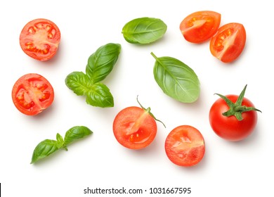 Tomatoes and basil leaves isolated on white background. Top view - Powered by Shutterstock