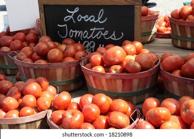 Tomatoes In Baskets At The Farm Stand