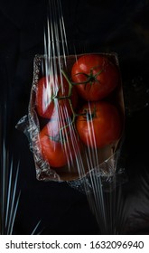 Tomatoes In A Box With Cling Wrap