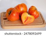 Tomatoes Madrid  - varietal tomato Madrid - ripe, sweet, heart-shaped in section