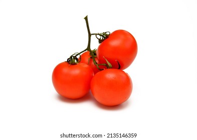 Tomatoes On A Branch Isolated On White Background