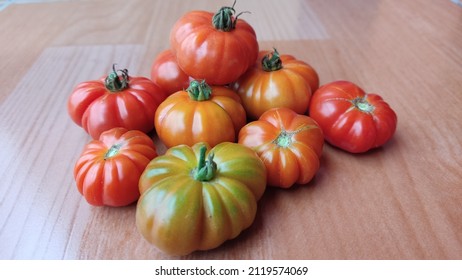 Tomatoes On The Floor. World Vegan Day Concept. Nature Photo Object