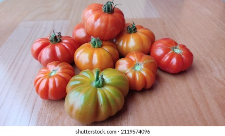 Tomatoes On The Floor. World Vegan Day Concept. Nature Photo Object