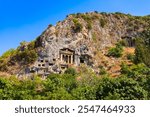 The Tomb of Amyntas or Fethiye Tomb is an ancient Lycian rock tomb at ancient Telmessos, in Lycia. Now it is in Fethiye city, Mugla Province, Turkey.