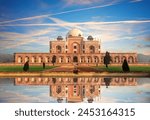 Humayun’s Tomb at sunset and its reflection, New Delhi, India