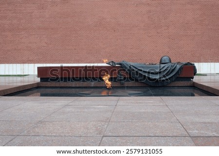 Tomb of the Unknown Soldier with a flame at the Kremlin Complex.