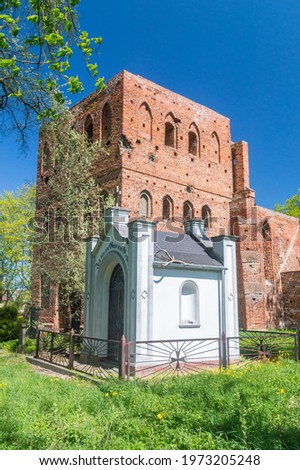 The tomb of the Wessel family and ruins of a 14th century gothic church in Steblewo, Poland. I am a guest on earth inscription on German language on chapel.