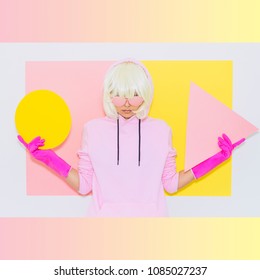 Tomboy Blonde Girl In Fashion Pink Accessory Sunglasses Holds Triangle And Circle On Gradient Background. Club Party Style. Synth Wave Vibes  