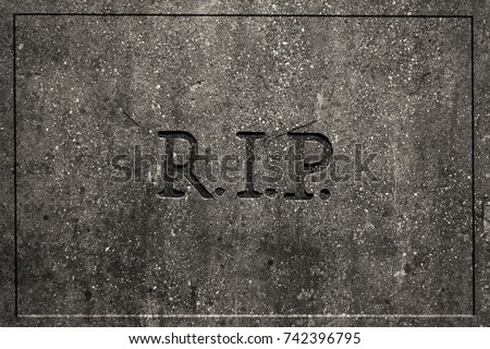 Tombstone with engraved R.I.P 
