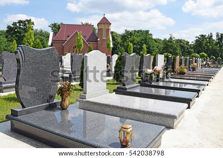 Tombstones and a chapel in the public cemetery