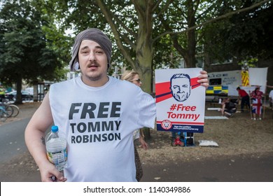 A Tommy Robinson supporter holds a sign during the Free Tommy Robinson protest in Cambridge, United Kingdom, 21/07/18.