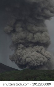 Tomohon, April 8, 2013: Large ash cloud rising from Tompaluan crater at Lokon Empung volcano, North Sulawesi. Tompaluan crater lies on saddle between older Lokon volcanoes