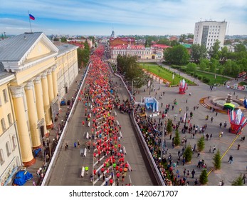 Tomsk, Russia - June 9, 2019: International Marathon Jarche Athletes Runners Crowd Are At Start. Aerial Top View.