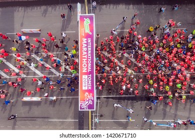 Tomsk, Russia - June 9, 2019: International Marathon Jarche Athletes Runners Crowd Are At Start. Aerial Top View.