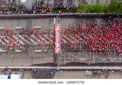 Tomsk, Russia - June 9, 2019: International Marathon Jarche Athletes Runners Crowd Are At Start. Aerial Top View.