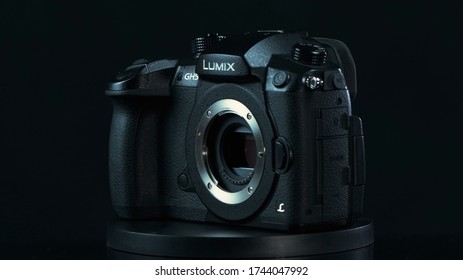 TOMSK, RUSSIA - May 28, 2020: Panasonic Lumix DMC-GH5 Camera Standing On A Black Turntable Without A Lens, Micro Four Thirds System, Black Background