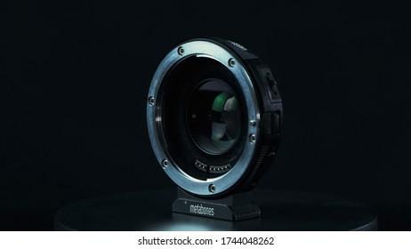 TOMSK, RUSSIA - May 28, 2020: Metabones Speedbooster 0.71 Ultra Standing On A Black Turntable, Micro Four Thirds System, Black Background