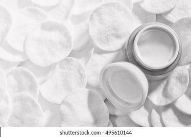 Tone Cream And Cotton Pads.