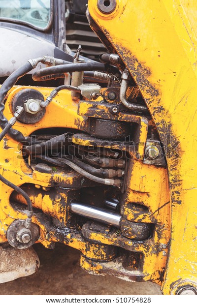 Toned the hydraulic system, high-pressure rubber\
hoses, shaft power systems unit construction bulldozer, excavator,\
loader