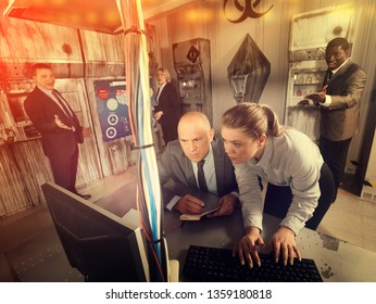 Toned image of businesspeople trying to get out of escape room stylized under laboratory. Concept of finding business solutions