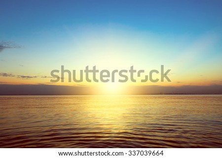 Toned Photo of Beautiful Summer Landscape of the Calm Sea and Sunset