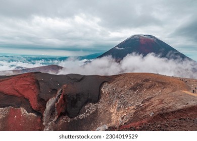 The Tongariro Crossing is a 19 kilometer hike that takes you right past the base of Mt Ngauruhoe also known of Mt Doom from Lord of the Rings. This is one of New Zealand's best day hikes. - Powered by Shutterstock