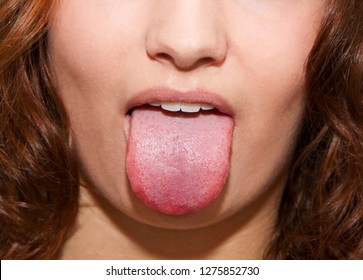 Tongue of a young woman